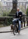 Amsterdam 15 oktober 2007
Mart Visser op zijn fiets met hond.