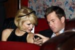 Amsterdam 14 april 2009
Paris Hilton en haar nieuwe vriend Doug Reinhardt bij jubileum van Rob Peetoom in Tuschinski.
Peter Smulders bv