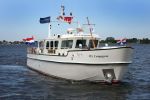 Loosdrecht, 12 Mei 2009
Vivian Boelen met haar compagnon Arjan v d Hoek bij hun boot, de M.S. Compagnon varend op de Loosdrechtse Plassen.
Foto Peter Smulders BV