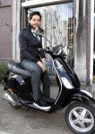 Amsterdam 15 april 2008
Percy Irausquin op een Vespa scooter.