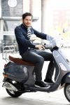 Amsterdam 23 april 2008
Percy Irausquin op zijn Vespa scooter.