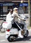 Amsterdam 21 april 2008
Regilio Tuur met vriendin Josh op vespa scooter met been in het gips en krukken.
Peter Smulders bv
