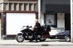 Amsterdam 21 april 2009
Rutger Hauer op zijn honda gold wing motor in amsterdam. Hij heeft een soort aanhanger achter zijn motor hangen en riookt heerlijk een sigaret.
Peter Smulders bv