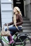 Amsterdam 27 april 2009
Susan Smit op de fiets.
Peter Smulders bv