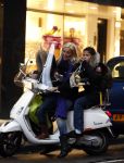 Amsterdam 2 december 2008
Angela v Hulten met Quincy en Justin  Kluivert op vespa scooter.
Peter Smulders bv