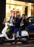 Amsterdam 2 december 2008
Angela v Hulten met Quincy en Justin  Kluivert op vespa scooter.
Peter Smulders bv