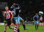 Eindhoven, 19 Maart 2008 Kompetitiewedstrijd PSV-AJAX, eindstand 0-0 
Seizoen 2007/2008
Dirk Marcellis wordt op de huid gezeten door Suarez