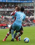 Eindhoven, 13 April 2008 Kampioenswedstrijd PSV-FC Twente, eindstand 1-1 Seizoen 2007/2008. PSV daardoor nog niet kampioen.
Jefferson Farfan in duel met Edson Braafheid