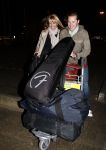 Rotterdam 29 februari 2008
Linda de Mol en 1eroen Rietbergen komen aan op vliegveld Zestienhoven na hun eerste liefdesvakantie in portugal. Buiten stormt/ waait het het.
Peter Smulders bv