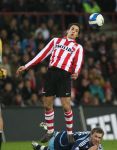 Eindhoven, 19 Maart 2008 Kompetitiewedstrijd PSV-AJAX, eindstand 0-0 
Seizoen 2007/2008
Otman Bakkal op de grond Rasmus Lindgren