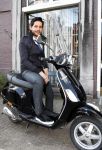 Amsterdam 15 april 2008
Percy Irausquin op een Vespa scooter.