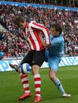Eindhoven, 13 April 2008 Kampioenswedstrijd PSV-FC Twente, eindstand 1-1 Seizoen 2007/2008. PSV daardoor nog niet kampioen.
Robbie Wielaert in duel met Danco Lazovic