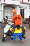 Eindhoven, 18 Juni 2010
Johan Vlemmix op zijn scooter in het Fifa shirt en Africa mascotte ( die inmiddels niet meer verkocht mag worden in Nederland ).
Foto Peter Smulders BV