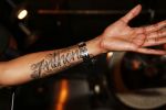 Den Bosch 21 juni 2013
Glennis Grace tijdens optreden met nieuwe tatoo voor haar zoon Anthony.
Peter Smulders bv