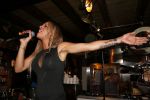Den Bosch 21 juni 2013
Glennis Grace tijdens optreden met nieuwe tatoo voor haar zoon Anthony.
Peter Smulders bv