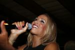Den Bosch 21 juni 2013
Glennis Grace tijdens optreden met nieuwe tatoo voor haar zoon Anthony.
Peter Smulders bv