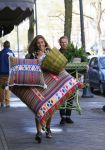 Amsterdam 6 mei 2015 
Danie Bles wandelt met kussens over de cornelis schuytstraat ivm event bij haar thuis in de tuin