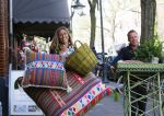 Amsterdam 6 mei 2015 
Danie Bles wandelt met kussens over de cornelis schuytstraat ivm event bij haar thuis in de tuin