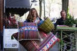 Amsterdam 6 mei 2015 
Danie Bles wandelt met kussens over de cornelis schuytstraat ivm event bij haar thuis in de tuin