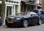 Amsterdam 9 mei 2015
Gerard Spong met zijn hondje en zijn Rolls Royce.