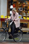 Amsterdam 29 mei 2015
Tjitske Reidinga op de fiets in Amsterdam.