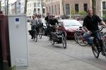 Amsterdam 31 mei 2016
Zangeres Adele met zoontje man en beveiliging op de fiets in Amsterdam.