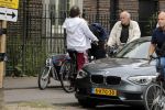 Amsterdam 31 mei 2016
Zangeres Adele met zoontje man en beveiliging op de fiets in Amsterdam.