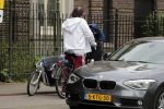 Amsterdam 31 mei 2016
Zangeres Adele met zoontje man en beveiliging op de fiets in Amsterdam.
