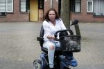 Breda 11 mei 2017
Andrea van der Kaap de weduwe van Sugar Lee Hooper op haar scootmobiel