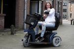 Breda 11 mei 2017
Andrea van der Kaap de weduwe van Sugar Lee Hooper op haar scootmobiel
