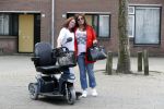 Breda 11 mei 2017
Andrea van der Kaap de weduwe van Sugar Lee Hooper op haar scootmobiel. Andrea met Valerie Lampereur