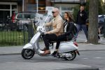 Amsterdam 16 juni 2017
Astrid Joosten achter op de vespa scooter bij Maik de Boer