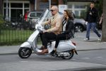 Amsterdam 16 juni 2017
Astrid Joosten achter op de vespa scooter bij Maik de Boer