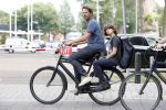 Amsterdam 29 mei 2017 
Mark v d Loo met zijn zoon op de fiets