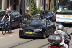 Amsterdam 29 mei 2018
Dirk Zeelenberg met kinderen in audi A5 cabrio.