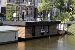 Amsterdam 22 mei 2019
Hans v d Togt is zijn woonark / woonboot compleet aan het verbouwen.