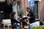 Amsterdam 18 mei 2020
Birgit Schuurman met zoontje op de motor. Ze gaan samen met haar vriend een ijsje eten