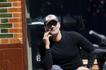 Amsterdam 6 mei 2020
Ruud Gullit met petje bellend in Amsterdam zuid