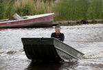 Westzaan 13 mei 2020
Wolter Kroes en zijn zoon Tom varen in een boot bij hun huis