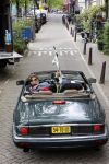 Amsterdam 29 mei 2021
Beau v Erven Dorens in zij Jaguar cabriolet in het centrum van Amsterdam.