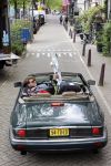 Amsterdam 29 mei 2021
Beau v Erven Dorens in zij Jaguar cabriolet in het centrum van Amsterdam.