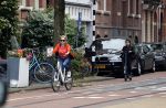 Amsterdam 5 juni 2021
Connei Witteman met haar kleinzoon op fiets en electrische step