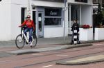 Amsterdam 5 juni 2021
Connei Witteman met haar kleinzoon op fiets en electrische step