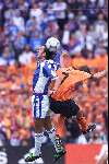 Rotterdam, 25 juni 2000   Euro 2000
Nederland-Yougoslavie, eindstand 6-1
Govedarica in duel met Cocu
Europees Kampioenschap Voetbal 2000
