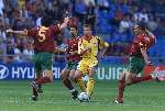 Arnhem, 17 juni 2000  Euro 2000
Roemenie-Portugal, eindstand 0-1
v.l.n.r.: Couto(5), Rui Costa(10), Petrescu(2) en Vidigal(4)
Europees Kampioenschap Voetbal 2000