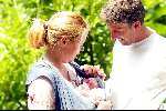 Hilversum 8 juni 2002
Esther Duller met baby en man en dochter