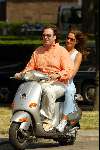 Amsterdam 30 juni 2003
Mariska Hulscher met vriend Philip op scooter