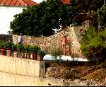 Porto Ercole 6 augustus 2003
Prins Bernhard in de buitenlucht douchend