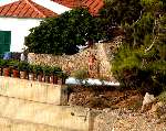 Porto Ercole 6 augustus 2003
Prins Bernhard in de buitenlucht douchend