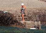 Porte Ercole 1997
Prinses Juliana zwemmend bij haar vakantieadres in Italie